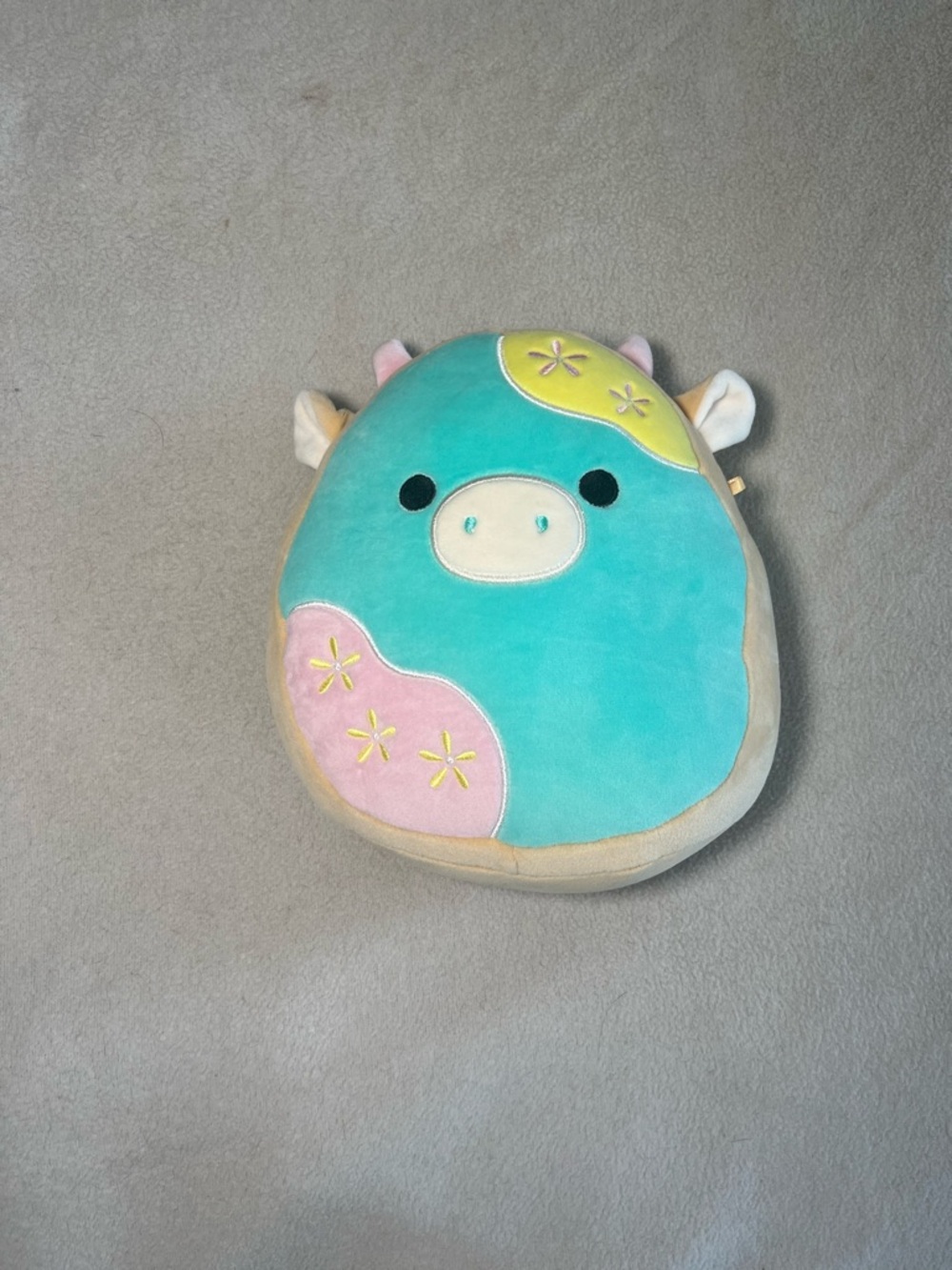 Squishmallows Aqua Teal Cow Plush with Pink and Yellow Accents